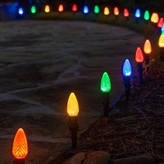 there are many colorful lights on the ground