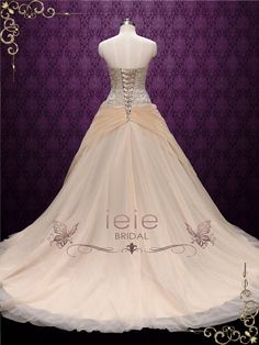 a white wedding dress on display in front of a purple background with the words iee bridal