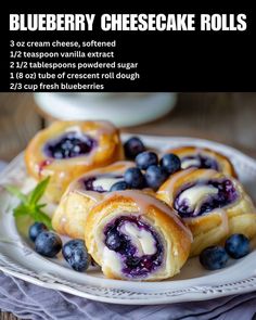 blueberry cheesecake rolls on a white plate