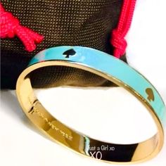 Kate Spade Spot The Spade Bangle Bracelet Blue / Gold Step Into The Spotlight And Shine With This Spade Spot The Spade Bangle. Features Bangle Bracelet With Signature Spades Shiny 12k Plated Gold/Enamel Inside Engraved Signature. Slip On. 2.5" Diameter Imported New Gift Boxed Dust Bag Is Not Included If An Offer Is Accepted For Less Than The Listed Price Elegant Blue Bracelets For Spring, Blue Bracelets For Spring, Trendy Kate Spade Bracelet, Spring Gift Jewelry By Kate Spade, Elegant Blue Kate Spade Jewelry, Travel Charm Bracelet, Kate Spade Heart, Kate Spade Bracelet, Kate Spade Bangle