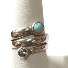 This Sterling Silver Wrap Style Ring Has A Band Of Sterling Silver Wrapped Around 3 Times With Larimar On One Tip And Faceted Blue Topaz On The Other. As With All My Listings, This Is New Never Worn. Thank You For Your Interest. Turquoise Topaz Ring With Accent Stones In Sterling Silver, Modern Silver Topaz Ring With Gemstone Accents, Elegant Blue Larimar Turquoise Ring, Elegant Blue Larimar Rings, Sterling Silver Turquoise Topaz Ring, Sterling Silver Turquoise Ring With Gemstone Accents, Blue Turquoise Ring With Gemstone Accents In Sterling Silver, Elegant Silver Stackable Rings With Natural Stones, Elegant Silver Turquoise Ring With Birthstone