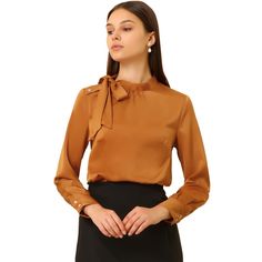 This blouse is made from smooth satin for an elevated feel with a stand collar and shirring on the cuffs for a pretty finishing touch. An effortless option to take the classic top at the office, this elegant blouse from Allegra K is gently designed with a stand collar and bow-tie design that makes a unique and charming. Finished with two-button cuffs is easy to roll up or put down your sleeves to create a stylish and casual look. Formal Satin Blouse With Button Cuffs, Elegant Tops With Button Cuffs And Stand Collar, Elegant Tops With Stand Collar And Button Cuffs, Formal Stand Collar Top For Fall, Office Satin Blouse With Button Cuffs, Satin Tops For Office In Fall, Stand Collar Blouse With Button Closure For Work, Elegant Semi-formal Tops With Stand Collar, Solid Color Stand Collar Blouse For Fall