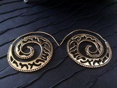 You are looking at a BEAUTIFUL pair of Handcrafted earrings> Made in Brass and then buff plated.> Long spiral Hook for comfortable wear works perfect for regular pierced ears.> Hypoallergenic.> Length of earrings 2 inch> Very lightweight>sold as pair only! The earrings that you will receive will look like picture 2,3 and 4** Please note model picture courtesy googleORIGINAL PRICE: $39.99SALE PRICE: $20.47ALMOST SOLD OUT. SPECIAL SALE FOR LAST FEW PIECES!!!A beautiful gift for s Bohemian Spiral Nickel-free Hoop Earrings, Bohemian Spiral Hoop Earrings For Pierced Ears, Bohemian Spiral Hoop Earrings In Metal, Bohemian Spiral Metal Hoop Earrings, Bohemian Adjustable Spiral Hoop Earrings, Nickel-free Spiral Earrings For Festivals, Bohemian Spiral Hoop Earrings As Gift, Bohemian Spiral Hoop Earrings, Bohemian Hypoallergenic Hoop Earrings For Festivals