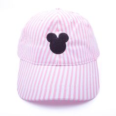 This Kids Mouse Ears Hat is the perfect way to protect your little one from excessive sun exposure while visiting the magical amusement park. The hat features an embroidered mouse ears and provides UPF 50+ protection to keep your toddler safe in the sun. It's a perfect accessory for playtime or sports. Available in a variety of colors to suit your style, you can personalize it with a monogram on the side for that extra special touch. Featuring a Velcro adjustable strap for a customized fit, it ensures comfort and convenience. Hat is sized to fit 2T to 4T Velcro adjustable strap Cute Adjustable Hats With Uv Protection, Cute Curved Brim Hat With Upf 50+, Cute Adjustable Baseball Cap, Playful Style Adjustable Baseball Cap With Curved Brim, Cute Adjustable Brimmed Baseball Cap, Fun Adjustable Baseball Cap With Uv Protection, Fun Mickey Mouse Themed Hat One Size Fits Most, Fun Mickey Mouse Hat, Cheap Adjustable Disney Hats