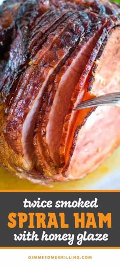 sliced ham with honey glaze on the side and text overlay reading twice smoked spiral ham with honey glaze