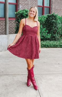 Get ready to turn heads on game day with The Tweed Garnet + Gold Dress! This easy babydoll fit dress is the perfect choice for dressing up while still showing off your team spirit. Simply add some boots and your favorite game day pin... and you're ready to go! Details: Woven, Tweed Game Day Dress Self: 100% Polyester Lining: 97% Polyester, 3% Spandex Sweetheart Neckline, Adjustable Straps, Babydoll Fit, Invisible Zipper Center Back Color: Garnet and Gold True to size: Student Slim Fit Madi is we Fall Tweed Mini Dress, Fall Tweed Mini Dress With Button Closure, Maroon Game Day Dress, Fitted Tweed V-neck Mini Dress, Gingham Plaid V-neck Dress For Day Out, Gameday Dress, Fashion Bottoms, Garnet And Gold, Alabama Crimson