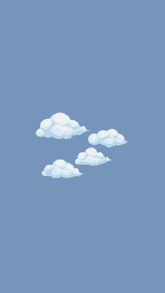 two airplanes flying in the sky with clouds