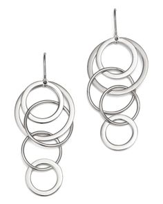 Intertwined circles add sleek simplicity and movement in these sterling silver earrings, designed exclusively for Bloomingdale's. Elegant Open Circle Sterling Silver Earrings, Sterling Silver Circle Earrings For Formal Occasions, Chainmail Jewelry, Circle Jewelry, Aluminum Jewelry, Punk Earrings, Jewelry Techniques, Exclusive Jewelry, Designer Earrings