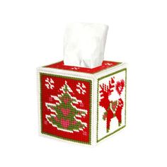 a tissue box with a christmas design on it