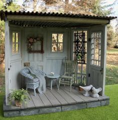 a doll house with furniture and accessories on the porch in front of an open door