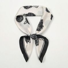 Elevate your style with our Chic and Versatile Printed Small Square Scarf for Fashionistas. This impeccably designed scarf is the perfect addition to any outfit, offering both fashion and function. Made with high-quality materials, it's lightweight and easy to style in multiple ways. Embrace your inner fashionista with this must-have accessory. Color : Black and White Material : Polyester Composition : 100% Polyester Element : Plants Product Technique : Printing Length Width 27.6 27.6 Black Silk Scarf As Summer Gift, Black Silk Scarf For Summer Gift, Elegant Black Summer Scarves, Trendy White Silk Scarf, Black Summer Scarves Trendy Style, Trendy Spring Scarves For Party, Black One-size Scarves For Spring, Black One Size Scarves For Spring, Trendy Black Summer Scarf