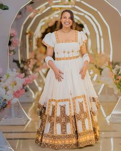 Discover the elegance of the Habesha dress, also known as Habesha kemis, a stunning Ethiopian traditional dress in beautiful brown and golden hues. Perfect for events, this attire combines exquisite craftsmanship with rich cultural heritage, making it ideal for any special occasion. Material Cotton Menen Thread Estimated delivery : 2 weeks to 3 weeks Contact WhatsApp +1(304)-306-2784Email: contact@ethiopian.store Festive Multicolor Bohemian Habesha Kemis, Gondar Ethiopia Dress, Traditional Festive Habesha Kemis Handloom, Gonder Ethiopia Dress, Zuria Habesha Dress 2022, Ethiopian Traditional Dress, Ethiopian Dress, Habesha Kemis, Turks And Caicos