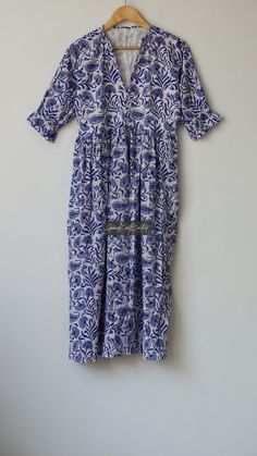 "Maxi Dress, Long Women Dress, Cotton Dress, Flower Print Dress, Indian Tunic Dress, Block Printed Dress, Boho Dress, Vintage  Dress, Gift  Material ~ 100% Cotton gauze. Care ~ Gentle hand wash. Air dry in shade. Made ~ India Please use the following measurements and information as a guide to find the best fit for you so you can flow effortlessly in GrandCraftsCollect. Size Chart in Inches:- Size S - Bust-40\" Size M - Bust-42\" Size L - Bust-44\" Size XL - Bust-46\" About fabric: *The fabric is so soft and with each wash becomes softer *Light weight & airy. *Rare and unique prints! Please zoom in the last pic for the complete view of beautiful prints! *Soft cotton- it becomes softer with each wash. ~~ Shipping Policy ~~ 1. We Ship the Orders Item Within 1-2 Business Days After Receiving O Flowy Printed Dresses For Beach Cover-up, Holiday Beachwear Dresses With Long Sleeves, Long Sleeve Beachwear Dresses For Holiday, Printed Flowy Tunic Dress, Flowy Printed Tunic Dress, Long Sleeve Floral Print Dress For Beachwear, Beach Floral Maxi Dress, White Maxi Length Holiday Dress, Vacation Cotton Printed Dresses