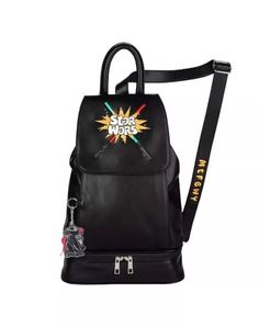 This Disney MTFBWY Star Wars Meets the '90s Crossbody Bag is the perfect accessory for any Star Wars fan. With a unique design featuring lightsabers and a keychain, this medium-sized bag is both functional and stylish. The bag is made of faux leather and has a black exterior color with silver hardware. The bag has a zip and buckle closure, with a black polyester lining material and a polyester lining color. It also has a keychain accessory and is suitable for unisex adults. The bag is 9.5 inches wide, 13 inches high, and 4.5 inches deep. The bag is not vintage and is part of the Star Wars product line. Star Wars Bag, Film Logo, Classic Star Wars, Small Zipper Pouch, Star Wars Logo, Medium Sized Bags, Disney Bag, Faux Leather Bag, New Star Wars