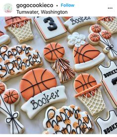 decorated cookies with basketballs and numbers are on a sheet of white paper that says happy birthday