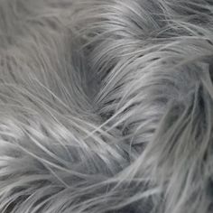 Charcoal Gray Shaggy Long Pile Faux Fur Fabric (4) - Fashion Fabrics LLC Silver Texture, Grey Fur, Shirting Fabric, Fur Fabric, Textile Company, Cat Mask, Faux Fur Fabric, Fur Fabrics, Real Fur