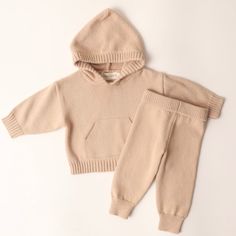 Stay cozy and stylish this fall and winter with our Hunter Knit Set! Made with soft knit cotton, this set is perfect for baby and toddler boys and girls. The hooded sweater features a front pocket for added warmth and the jogger pants are comfy for all their fall and winter activities. Perfect for pumpkin patches, family photos, or just playing outside and cozying up inside. Material: 100% Cotton Teddy Collections, Delivery Gown, Diaper Bag Accessories, Pumpkin Patches, Pyjamas Womens, Bamboo Pajamas, Pajama Dress, Baby And Toddler, Mens Pajamas