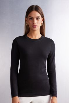 Wool & Cotton Long Sleeve Crewneck Top for sale on Official Intimissimi online shop. Discover all the latest products and buy them on the Intimissimi online shop. Snug Fit Long Sleeve Ribbed Tops, Snug Fit Ribbed Long Sleeve Tops, Workwear Ribbed Merino Wool Tops, Ribbed Merino Wool Tops For Work, Solid Crew Neck Top With Thumbholes, Everyday Crew Neck Long Sleeve Top With Thumbholes, Merino Wool Ribbed Tops For Work, Solid Merino Wool Tops For Winter, Fitted Long Sleeve Top With Thumbholes Crew Neck