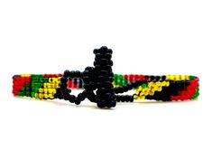 One Love Beaded Jamaica Bracelet - Rastafarian Jewelry - Jamaican Flag Colors - African Bracelet - For Men & Women Wrap your wrist in Jamaica, mon', with these brilliantly beaded bracelets! Both casual and trendy, these bracelets make a great every day accessory. *Please note that all of our items are handcrafted and unique to each piece. Also, colors may vary slightly based on your device. Like what you see here? Check out all of our beautiful handmade products at www.KAQCHI.com and follow Black Wristband With Colorful Beads Gift, Adjustable Black Friendship Bracelet With Colorful Beads, Adjustable Black Wristband With Colorful Beads, Black Beaded Bangle Bracelets For Friendship, Black Beaded Friendship Bangle Bracelet, Adjustable Black Braided Bracelet With Colorful Beads, Jamaica Bracelet, African Bracelet, African Bracelets