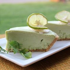 two slices of limeade pie on a white plate