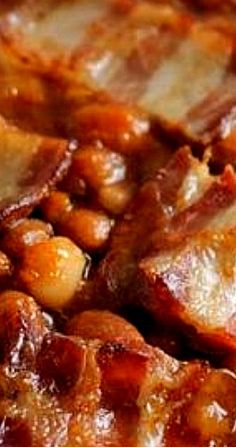 closeup of meat and beans on a plate