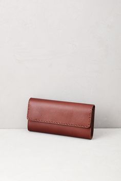 Designed for ultra-organization, the women's leather wallet is packed with all the details you need to hold all your credit cards, IDs, checkbook, cash, and more all in one place and right at your fingertips. This wallet is crafted of soft yet durable leather that easily coordinates with all your other accessories, making it an everyday essential you'll appreciate for many years. Trifold Clutch For Daily Use, Trifold Wallets For Everyday Use, Leather Trifold Clutch For Everyday Use, Trifold Leather Clutch For Everyday Use, Versatile Leather Clutch Wallet, Leather Wallet In Rectangular Case For Everyday Use, Leather Trifold Clutch For Travel, Brown Rectangular Wallet For Everyday Use, Classic Leather Trifold Clutch