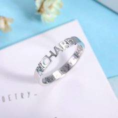 Finely crafted - This personalized name ring comprises of a Hollow carving design, which makes it an absolutely beautiful piece. It looks good alone or stacked with each other. Perfect Gift for someone special - This ring is Ideal for your special one as a gift. Customizable piece - Simply perfect, these stacking rings can be engraved with a name and words inside it. Go ahead, stack it up! Item specifics: Style Name Ring Width of Ring Band 3MM(0.12INCH) Thickness of Ring 1.2MM(0.048INCH) Materia Engraved Rings Personalized, Stackable Name Rings, Mother Necklace Personalized, Rings Personalized, Name Necklace Silver, Name Ring, Name Rings, Special One, Memorial Necklace