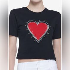 We've All Had Our Hearts Broken! Sometimes It Feels Like They've Been Put Back Together With Safety Pins And Thread. This Cropped Tee Shows An Appliqu Heart With Stitching Around It And Safety Pin Detail. 60% Cotton; 40% Polyester New Without Tags. Bin #1809 Red Heart-shaped Graphic Tee, Trendy Red Top With Heart Print, Trendy Black Tops With Heart Print, Trendy Black Top With Heart Print, Black Graphic Print Top For Valentine's Day, Black Tops With Heart Graphic And Short Sleeves, Black Short Sleeve Top With Heart Graphic, Trendy Crew Neck Top For Valentine's Day, Trendy Cotton Tops For Valentine's Day