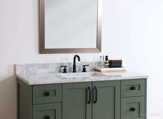 a bathroom vanity with two sinks and a mirror