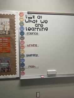 a bulletin board with different types of buttons and words on it that say look at what we are learning