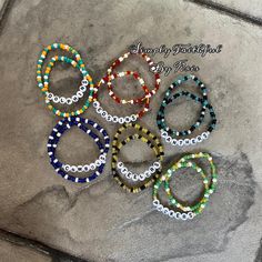 NFL football teams beaded bracelet sets. Nfl Beaded Bracelets, Cheap Adjustable Bracelets For Football Season, Football Team Bracelets, Nfl Bracelets, Braclets Diy, Team Bracelets, Football Bracelet, Nfl Football Teams, Beads Bracelet Design