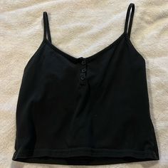 Brandy Melville Cropped Tank Color: Black Size: Osfa Nwot, Never Worn, Perfect Condition Willing To Accept Offers Feel Free To Comment With Any Questions! Casual Black Cami Top, Black Cotton Tank Top For Day Out, Casual Black Cami Crop Top, Trendy Black Cami Top, Brandy Melville Clothes, Tops Brandy Melville, Brandy Melville Tank, Cropped Polo, Black Cropped Tank