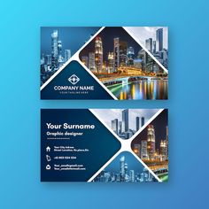 two business cards with cityscape in the background