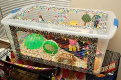 a bird cage filled with lots of toys