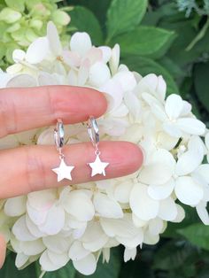 925 Sterling Silver Plain Star Dangle Huggie Hoop Earrings    - Metal: 925 Sterling Silver - Shape: Round Huggie Hoop with Dangle Star - Dimension:  Total Length: 23mm(0.91 in); Hoop: Outer Diameter 11.5mm(0.45 in), Inner Diameter 9mm(0.35 in), Face Width 1.1mm;  Star: 7.8mm(0.31 in) x 0.8mm. (Please note that the hoop's diameter is 11.5mm(0.45")/9mm(0.35"), VERY SMALL for Small ear lobe.) - Closure: Leverback  - Color: Silver Hypoallergenic Star Hoop Earrings For Everyday, Everyday Hypoallergenic Star Hoop Earrings, Silver Star Huggie Earrings Minimalist Style, Sterling Silver Huggie Earrings With Charms, Everyday Hypoallergenic Star Huggie Earrings, Sterling Silver Star Hoop Earrings With Ear Wire, Sterling Silver Star Huggie Earrings Minimalist Style, Everyday Silver Hoop Earrings With Star Charm, Silver Star Huggie Earrings For Everyday