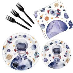 the space themed plates and utensils are ready to be eaten