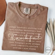 This cute, funny Comfort Colors Thanksgiving shirt is perfect for family reunion dinners or for a Thanksgiving gift for the host with a dry sense of humor! P R O D U C T∙ D E T A I L S   *  Brand:  Comfort Colors   *  Fabric:  100% ring-spun cotton.  Medium weight   *  Fit:  Relaxed fit.  Runs large   *  Your shirts are carefully made with attention to small details ♡     C A R E  ∙ I N S T R U C T I O N S   *  Turn inside out.  Cold water wash with like colors only *  Mild detergent.  Do not bl Funny T-shirt With Text For Family Reunion, Funny Text T-shirt For Family Reunion, Funny Cotton T-shirt For Family Reunion, Funny Tops With Text For Family Reunion, Custom Text Crew Neck Tops For Family Gatherings, Funny Long Sleeve T-shirt With Text, Thanksgiving Cotton T-shirt With Letter Print, Friend Thanksgiving, Friendsgiving Shirt