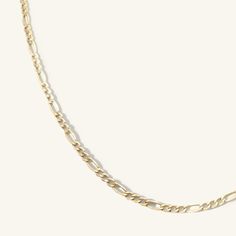 2.6mm Figaro chain crafted in 10k yellow gold with three length options. This brand new chain style is reminiscent of chains of days past and lays on the body like liquid gold. Timeless Gold-plated Figaro Chain Necklace, Timeless Figaro Chain Link Necklace, Timeless Figaro Link Chain Necklace, Gold 14k Figaro Chain Necklace, Timeless Figaro Chain Necklace, 14k Yellow Gold Figaro Chain Necklace, Timeless 14k Gold Figaro Chain Necklace, Yellow Gold Plated Figaro Chain Necklace, 14k Gold Figaro Chain Link Necklace