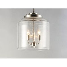 a small glass light fixture with three lights on each side and one hanging from the ceiling