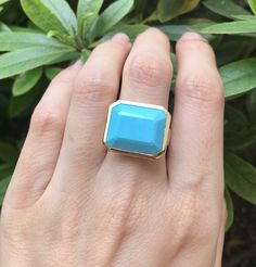 "A genuine large rectangular-shaped faceted Blue Turquoise, Robins Egg Blue Hue aka Sleeping Beauty, set on a minimalist bezel is a great statement/cocktail ring. Made to order in your choice of metal 14k Yellow Gold, Rose Gold or White Gold FINAL SALE Instagram Video ----------------- https://instagram.com/p/BiXzeTqlqIb/ https://instagram.com/p/Biuu4QnFZmJ/ https://instagram.com/p/BjstMbtlEEW/ Face measure 16mmx 18.7mm Shank width 3.5mm Sits off the finger 5.7mm ----> Please note there is an Rectangular Turquoise Gemstone Ring, Modern Blue Turquoise Gemstone Ring, Turquoise Emerald Cut Gemstone Jewelry, Emerald Cut Turquoise Gemstone Jewelry, Blue Rectangular Faceted Jewelry, Modern Blue Faceted Rings, Rectangular Blue Turquoise Gemstone Ring, Turquoise Gemstone Rings With Emerald Cut, Turquoise Emerald Cut Gemstone Ring