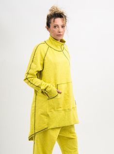 Grab a look from the archives with this Yellow asymmetrical sweatshirt women. In a yellow colour minimal design, this sweatshirt is made from a soft cotton blend to keep your feelin' comf' and chilled out. Coming in an overhead design, this Yellow asymmetrical sweatshirt women has one side front pocket, and a zipper with two sliders. Finished with thumb holes on the sleeves. This Cotton sweatshirt women plus size clothing is designed to flatter every body type and fit perfect. When we designed t Yellow Long Sleeve Sweatshirt In Athleisure Style, Yellow Long Sleeve Sweatshirt Athleisure, Yellow Long Sleeve Sweatshirt For Athleisure, Yellow Athleisure Sweatshirt For Fall, Yellow Fall Athleisure Sweatshirt, Oversized Yellow Sweatshirt For Loungewear, Yellow Oversized Sweatshirt For Loungewear, Khaki Overalls, Asymmetrical Sweatshirt