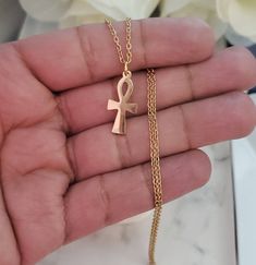 Gold Ankh Necklace. Dainty Cross Necklace, Minimalist Chain is a 1mm Cable Chain, Crucifix is 15mm in height and 10mm width. Made of 14k Gold Over Stainless Steel High Quality Necklace, Will Not Fade ALWAYS BEST PRICES No need to wait on any sale to get these amazing low prices! Please compare my prices and see for yourself! If you have any questions, please feel free to contact me, I responded quickly! 😉 Nickel Free Ankh Jewelry Gift, Symbolic Jewelry With Delicate Chain For Gift, Symbolic Jewelry Gift With Delicate Chain, Symbolic Jewelry As A Gift With Delicate Chain, Hypoallergenic Chain Necklace As Gift, Minimalist Cross Pendant Chain Necklace As Gift, Gift Cross Chain Necklace With Delicate Chain, Delicate Cross Chain Necklace Gift, Gift Cross Necklace With Delicate Chain