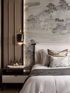 a bedroom with a large wallpapered mural behind the headboard and foot board