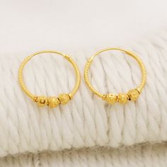 Please click -- Learn more about this item -- below for a full description 22k gold earrings handmade jewelry made in India weight is 3.68 grams approx. length is 2.2 centimeter approx. width is 2.2 centimeter approx. please message me if you want real gold screw/backs. Small Gold Hoop Earrings For Festivals, 22k Yellow Gold Round Earrings, Festive Gold Hoop Earrings Gift, Festive Gold Hoop Earrings, Festive Yellow Gold Hoop Earrings For Gift, 22k Gold Hoop Jewelry For Festive Occasions, 22k Gold Hoop Earrings For Anniversary, Gold Hoop Earrings For Diwali, Festive Yellow Gold Hoop Earrings As Gift