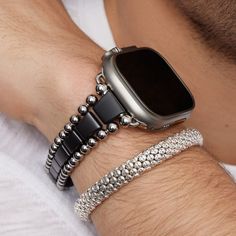 A LAGOS exclusive. One matte black ceramic smart Caviar watch band and one sterling silver skull Caviar beaded bracelet. Set includes size medium. Modern Silver Beaded Bracelet With Black Beads, Modern Gunmetal Jewelry With Bracelet Strap, Modern Silver Bracelet With Black Beads, Black Wear-resistant Rectangular Apple Watch Band, Luxury Black Sterling Silver Men's Bracelet, Black Skull Bracelets For Streetwear, Lagos Bracelet, Lagos Caviar Bracelet, Ceramic Watch