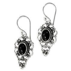 These elegant earrings reveal the influence of royal Balinese design, designed by Komang Wirwan. Embraced by sterling arabesques, sleek black onyx evokes the night. Sterling silver & onyx Hook earrings Handmade in & fairly traded from Indonesia Balinese Design, Paw Print Jewelry, Ribbon Jewelry, Fair Trade Jewelry, Printed Jewelry, Discount Jewelry, Sterling Silver Dangle Earrings, Balinese, Silver Earrings Dangle