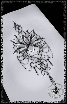 a black and white drawing of a flower on paper