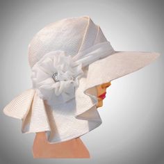 This couture hat was handmade on an antique hat block using a parasisal straw.  This is the large- wired-brimmed version of Sophia.  This lovely hat is embellished with silk georgette and a vintage button.   Please indicate your head size measurement when ordering (measure your head horizontally just above your eyebrows). When you receive your hat, there will be a small ribbon inside to fine-tune the fit, and a hat box for safe storage. Note: Colors will vary depending on your monitor and there Elegant White Fedora Straw Hat, Luxury White Sun Hat With Curved Brim, Elegant Cloche Hat For Beach And Kentucky Derby, Elegant Wide Brim Sun Hat In Sinamay, Elegant Fedora Straw Hat For Church, Elegant Sinamay Straw Hat With Short Brim, Elegant Cream Toquilla Straw Hat, Elegant Cream Cloche Hat For Beach, White Wide Brim Straw Hat For Evening