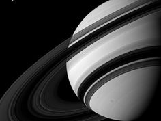 saturn with the rings in black and white