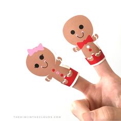 two finger puppets made to look like babies